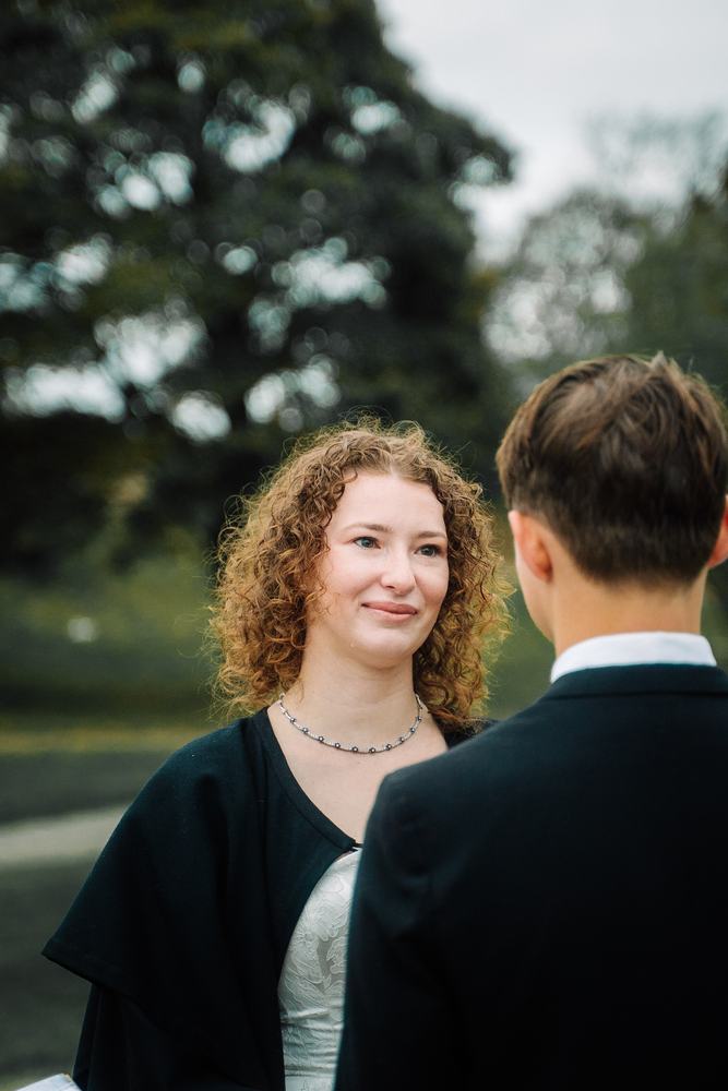 Bride laughing during the vows