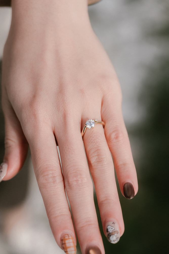 Close-up of a hand with a new engagement ring